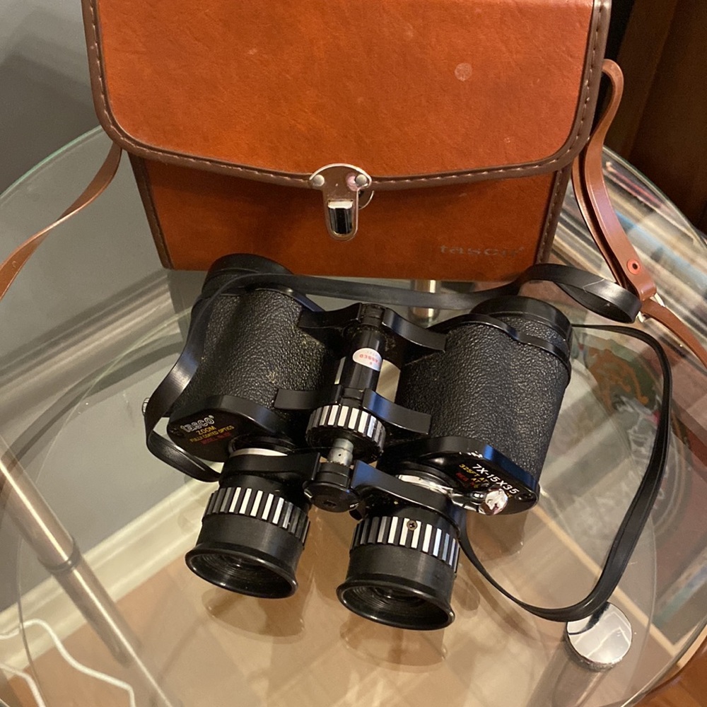 Vintage Tasso binoculars with leather case.